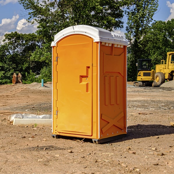 how often are the portable restrooms cleaned and serviced during a rental period in Mascot